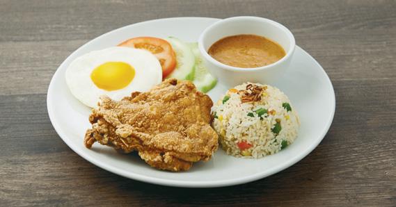 Sauce Deep fried battered chicken served with fried rice, fried egg, cucumber and tomato slices with a choice of