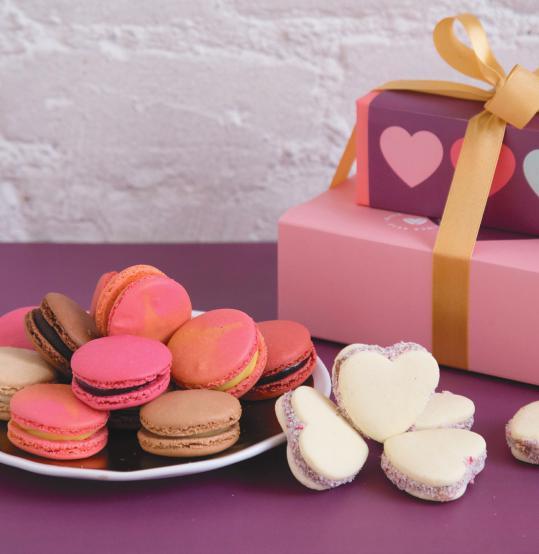 HAPPY VALENTINE S DAY MINI COMBO STACK Our premium Box of Heart-Shaped Alfajores (5pc) Box of 9 Macarons Assortment of Strawberry Passion Fruit, Dark Chocolate, Rose,