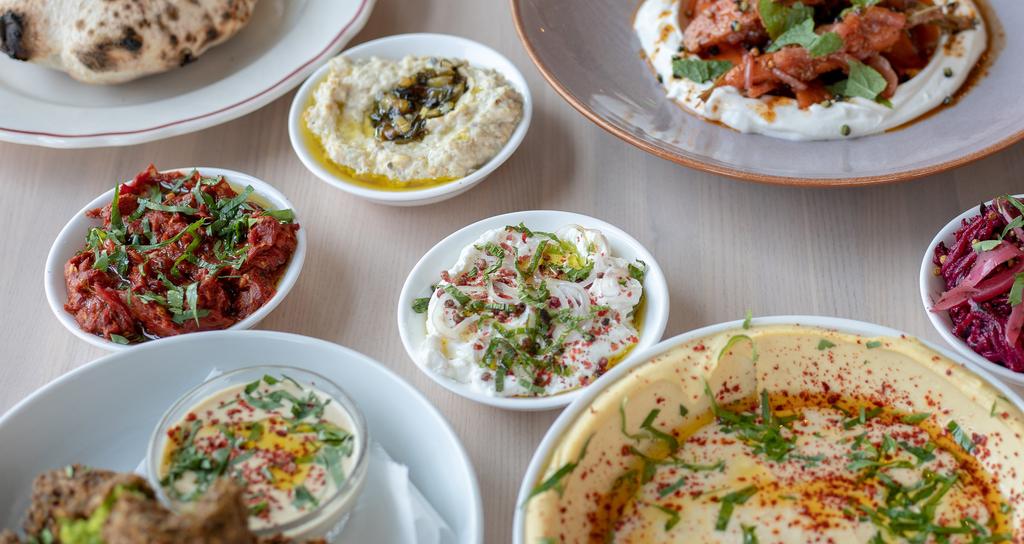 SAFTA S TABLE Dinner Menu Options $45 PER PERSON 5 salatim 1 hummus 2 small plates 1 large plate $60 PER PERSON 5 salatim 2 hummus 2 small plates 2 large plates 1 sides 1 dessert If you would like to