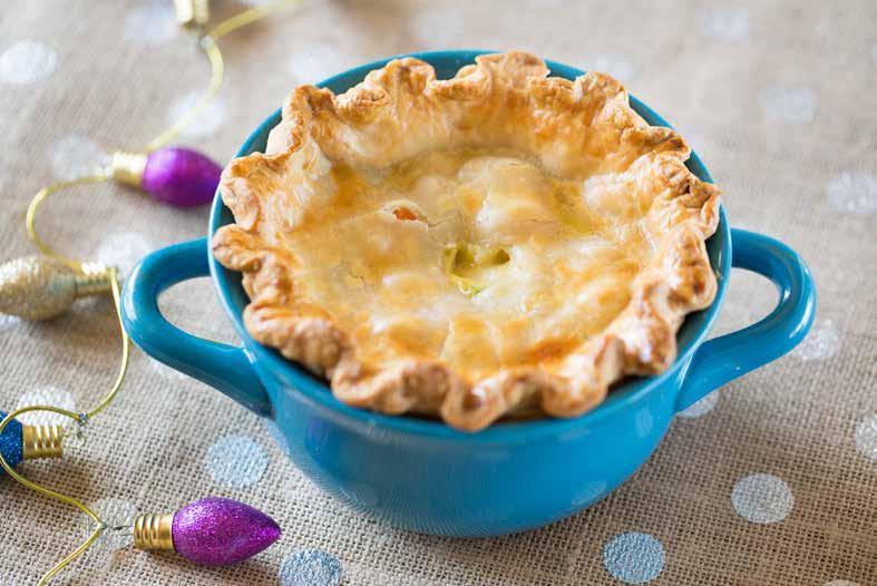parsley, chopped Turkey Pot Pie 1 box refrigerated pie crust 2 cups chopped and shredded turkey meat ½ stick Braum s Unsalted Butter 1 small yellow onion, chopped 1 cup frozen peas ½ cup carrots,