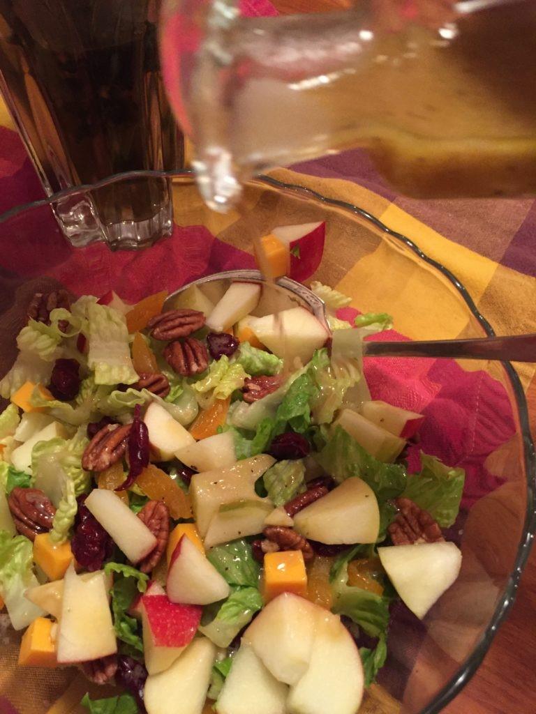 tossed cranberry salad 15 min 6 ingredients The salad: 2-3 C romaine lettuce or spring greens or a mixture of both 1/2 Honey crisp apple, unpeeled,cut in small chunks and placed in a bath of water