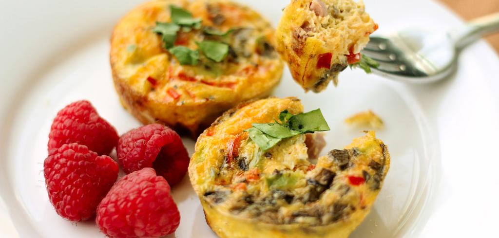 Grab-N-Go MINI QUICHES COOK TIME 30 MINUTES 12 MUFFINS O N T H E GO INGREDIENTS// 12 eggs 3 cups chopped veggies & meat (Example uses red and green pepper, mushroom & ham) 1/2 cup shredded cheese