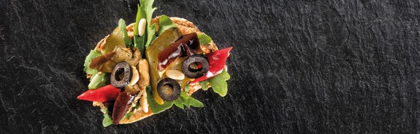Canapé grilled vegetables Type of bread baguette with olives Spread