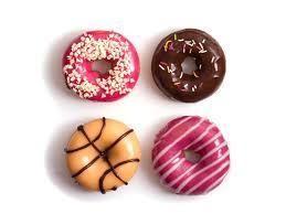 confectionery or dessert food. Doughnuts are usually deep-fried from a flour dough, and typically either ring-shaped or without a hole, and often filled.