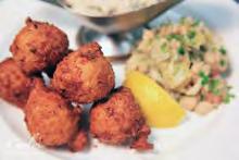 sauce Conch Fritters $11 A Florida favorite served with our jicama green apple slaw and tartar sauce Island Killer Shrimp $12 Jumbo shrimp seared in Cajun spices, finished with a dark beer seafood
