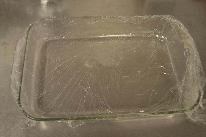 Stir to blend. Line a glass Pyrex dish with plastic wrap.