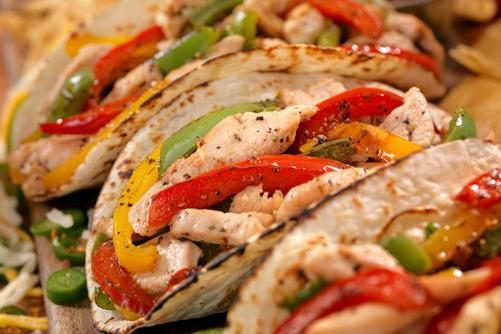 Seasoned Chicken and Beef served with grilled Onion and Peppers.
