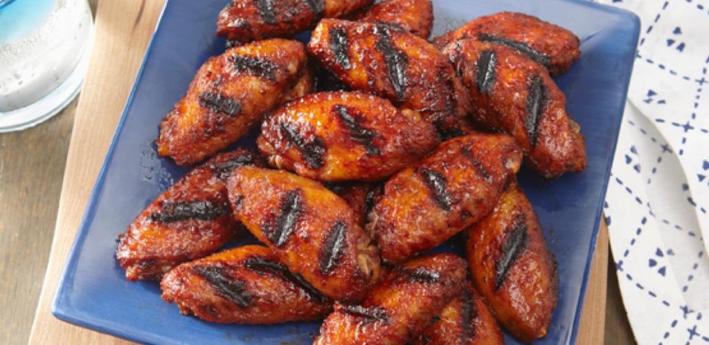 GARLIC SRIRACHA RUB GLAZED WINGS MAKES 8 TO 10 APPETIZER SERVINGS 2 pounds/1 kg chicken wingettes 3 to 4 tablespoons Weber Garlic Sriracha Seasoning 1/2 cup honey 1/2 cup frozen apple juice