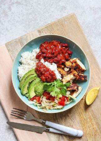BURRITO BOWL WITH GRILLED CHICKEN Serves: 4 Prep: 15 mins Cook: 15 mins 443 kcals 36g Fats 47g Carbs 34g Protein 14 oz. (400g) brown rice, cooked 1 tbsp. coconut oil fajita spices 14 oz.