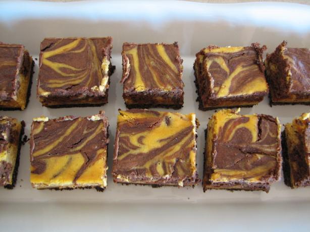 Chocolate Pumpkin Cheesecake Bars For the Crust: 20 chocolate wafer cookies or use chocolate graham crackers 2 tablespoons sugar 4 tablespoons butter, melted For the Filling: 2 packages cream cheese,