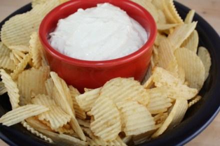 Onion Dip 1-2 tablespoons of oil 1 onion, chopped 2 cloves garlic, minced 1/2 cup water 1 cup sour cream 8 ounce of cream cheese 2-3 tablespoons mayonnaise ½ teaspoon salt ( or more to taste) ½