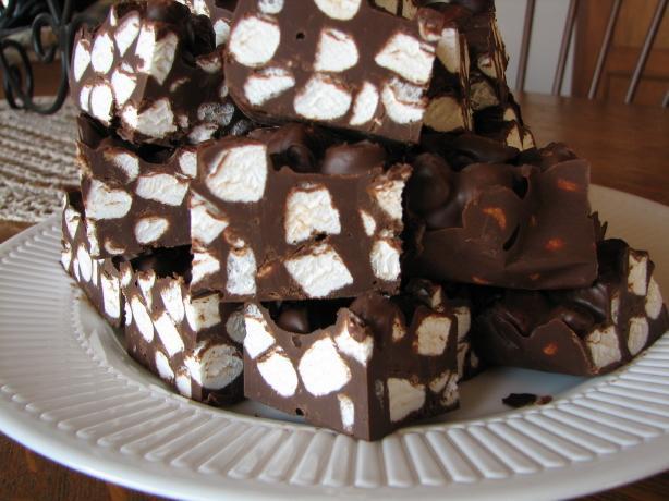 Rocky Road Candy 2 cups semisweet chocolate chips 1 cup peanut butter 4 cups miniature marshmallows Grease a 9 x 9 inch pan. Heat chocolate chips and peanut butter until melted.