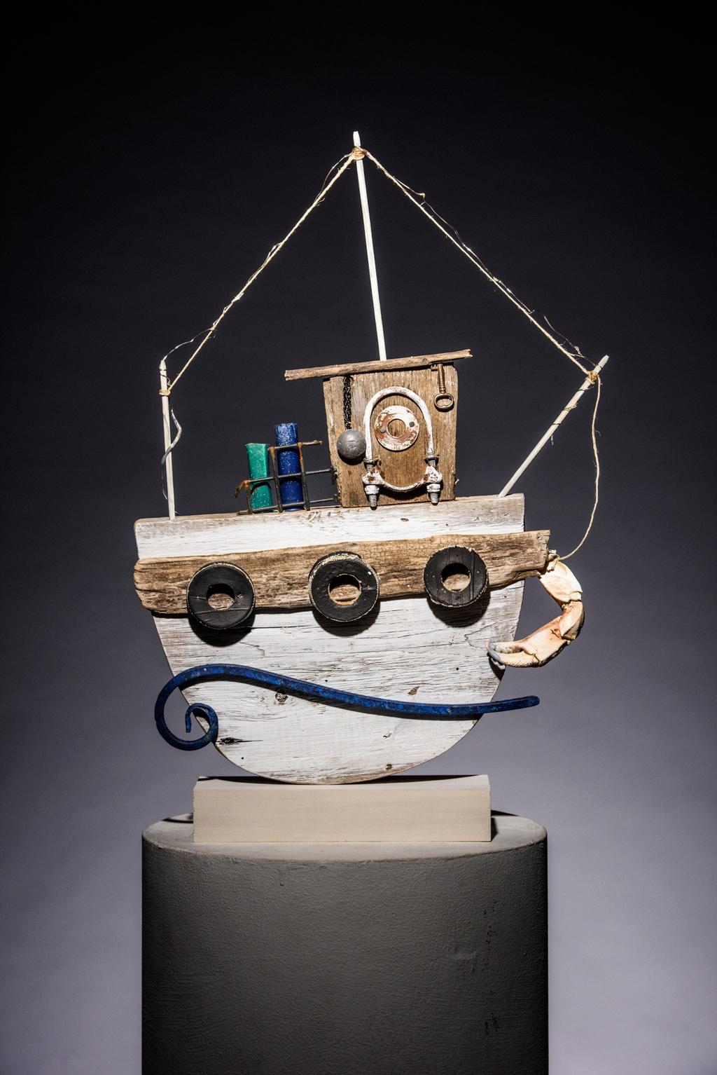 One of a Kind Trophies for a One of a Kind Event! We commission an accomplished New England artist to create unique nautical sculptures that are turned into trophies.