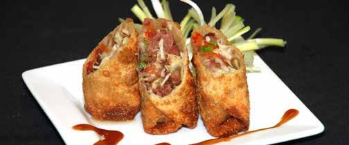 Corned Beef Egg Roll Egg Roll Wrapper Slaw mix Minors Teriyaki sauce Red pepper Green onion Eggs Prebrown corned beef hash and cool down.