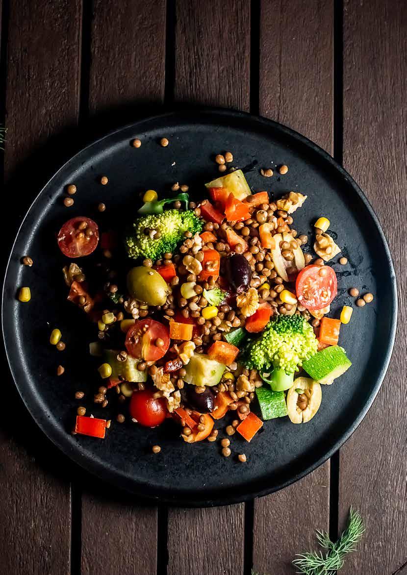 LUNCH LENTIL SALAD 225g / 3 cups cooked green or brown lentils 3 tbsp olives 1 pepper 7 cherry tomatoes 1 courgette, lightly steamed ½ head broccoli, steamed 50g / ½ cup corn