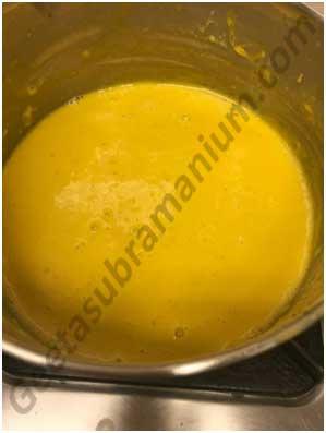 ~ 32 ~ 6. Add 1 tbsp ghee to a wok, let it heat and add the mango puree. Saute on a gentle flame till the puree starts thickening. 7.