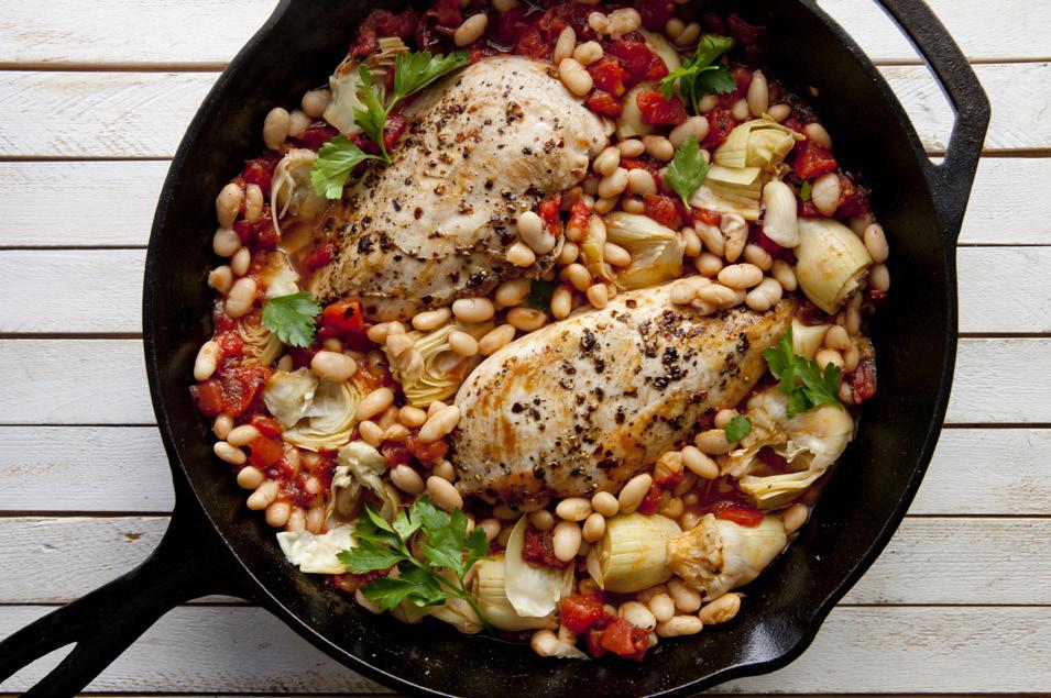 Chicken Skillet Bake Yield: Serves 4 Time: 30 min. 1 1/2 lb. chicken breasts, cut into four servings 2 Tbsp. olive oil 1 15-oz. can diced tomatoes 2 15-oz. cans white beans 1 15-oz.