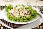 Apple Waldorf Salad Number of Servings: 6 Serving Size: 2/3 cup 2 cups diced apples 1 cup diced celery 1/2 cup raisins or dried cranberries 1/2 cup walnuts, chopped 6 ounces low-fat plain yogurt or 2