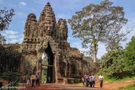 South Gate of Angkor Thom: is famous for its series of colossal human faces carved in stone, the impressive Bayon