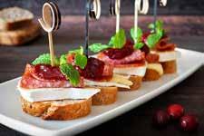 ..$30 With a Cranberry Dipping Sauce CANDIED SWEET POTATO & SAUSAGE SKEWER...$24 With a Bourbon Maple Glaze GARLIC FOCACCIA BREAD.