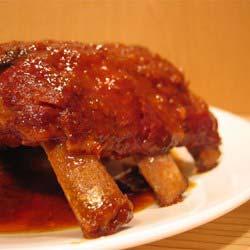 Maple Glazed Ribs Servings: 6 Yield: 6 servings Cook: 1 hour 25 minutes Preparation Time: 15 minutes 3 pounds baby back pork ribs 3/4 cup maple syrup 2 tablespoons packed brown sugar 2 tablespoons