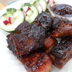 Simple Country Ribs Servings: 4 Yield: 4 servings Cook: 1 hour Preparation Time: 10 minutes 2 1/2 pounds pork spareribs 36 ounces barbeque sauce 1 onion, quartered 1 teaspoon salt 1/2 teaspoon ground