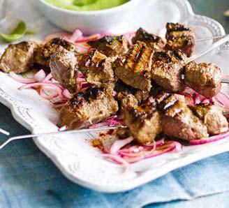 Spiced Grilled Lamb Skewers 900 g boned leg of lamb, cut into 2cm in cubes 85 g plain yogurt 25 g ginger 5 fat garlic cloves 1/2 teaspoon red chilli powder, or to taste 1 tablespoon vegetable oil 2