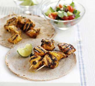 Chicken Masala Skewers Servings: 4 Cook: 12 minutes Preparation Time: 15 minutes 150 ml 0% fat Greek yogurt 2 tablespoons masala paste handful coriander leaves, chopped, plus extra leaves to serve