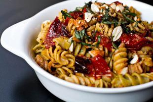 Side Dishes Roasted Tomato Basil Pesto Pasta 9 large roma tomatoes, sliced in half lengthwise 1/2 cup almonds, toasted 2 garlic cloves 1 cup tightly packed basil + more for garnish 1/4 cup extra