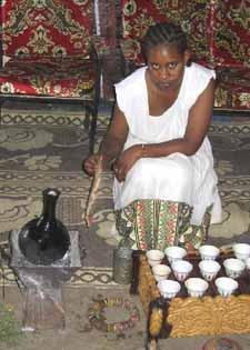 Ethiopian Coffee Ceremony (source: http://www.epicurean.com/articles/ethiopian-coffee-ceremony.html ) 1. The roasting of the coffee beans is done in a flat pan over a tiny charcoal stove. 2.