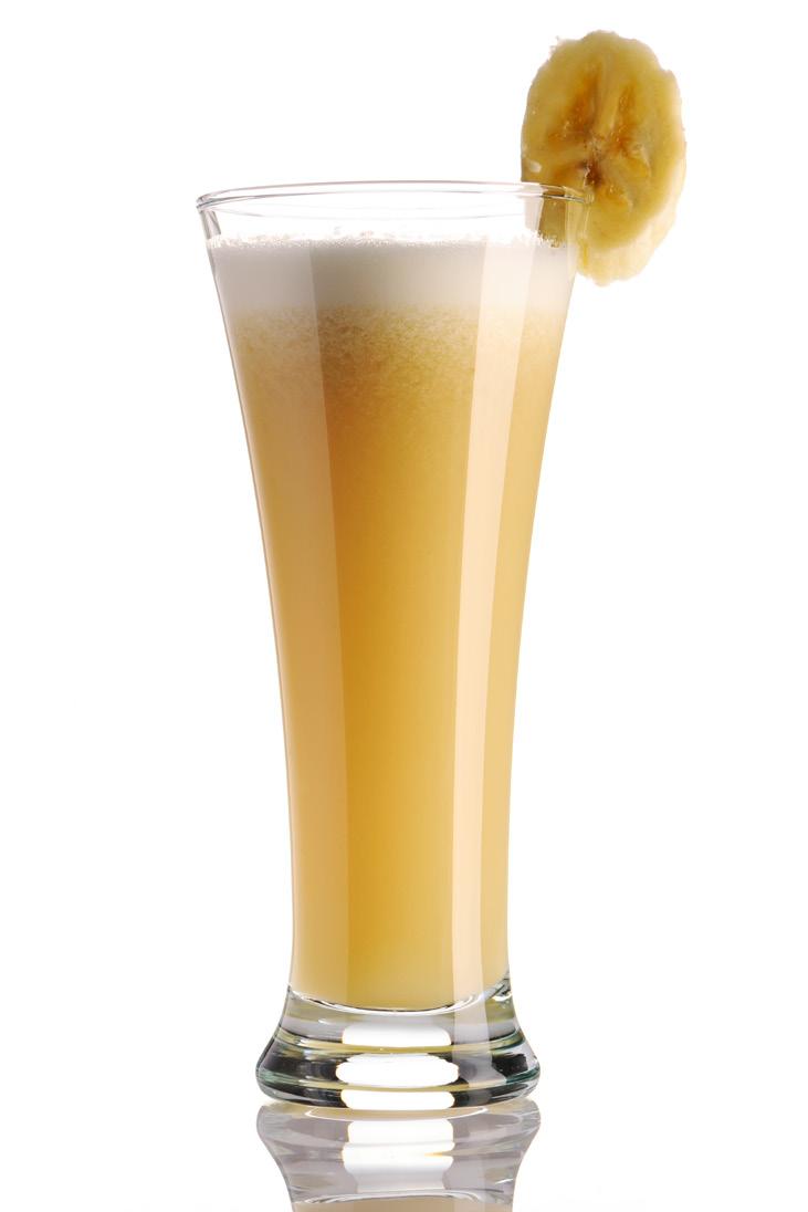 Fill tall glass with ice cubes. Pour glass half full of puree. Add ginger ale to fill. Stir. Sweeten to taste with grenadine or sugar syrup. Banana Smoothie ½ cup dried banana chips 8 oz. yogurt 8 oz.