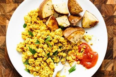 With a spatula or fork, mash tofu until it crumbles to the texture of scrambled eggs. Stir until wellmixed.