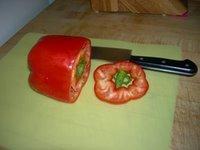HOW TO CUT A BELL PEPPER: Method #1 1. First, lop off the top.