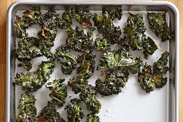 Kale Chips Total time: 25 mins Servings: 4-8 loosely packed cups kale, torn into 1-1½ pieces, tough stems removed - 2 tbsp.