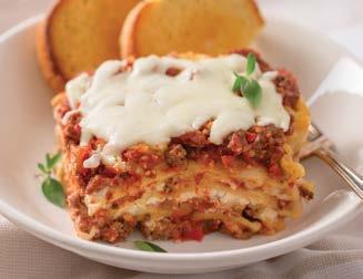 Easy Slow-Cooker Lasagna 1½ pounds lean ground beef 1 (28 ounce) can crushed tomatoes 1 (15 ounce) can tomato sauce ¼ cup Vidalia Onion Dressing 4 tablespoons Dried Tomato & Garlic Pesto Mix 1½