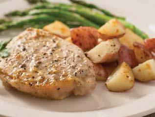 One-Pan Pork Chops & Potatoes 6 boneless pork loin chops (about 2 pounds), seasoned with salt and pepper ¼ cup Brown Sugar Honey Mustard ¼ cup Vidalia Onion Dressing 2 pounds baby red potatoes, cut