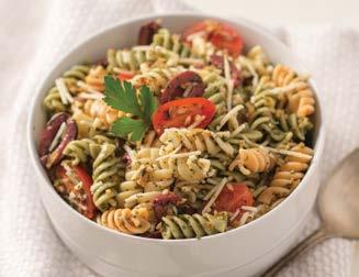Italian Pesto Rotini Salad 7 tablespoons Dried Tomato & Garlic Pesto Mix ½ cup water ⅓ cup olive oil 12 ounces tri-colored rotini pasta, cooked and cooled 1 cup halved cherry tomatoes 1 cup shredded
