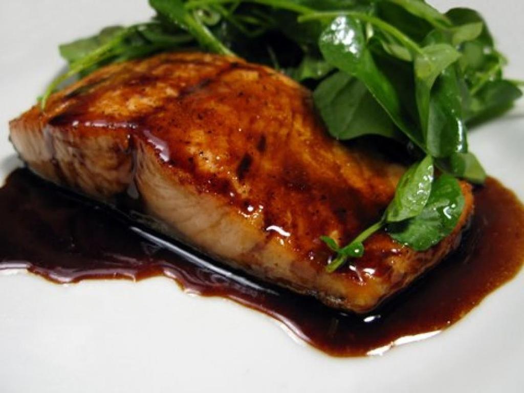 Balsamic Glazed Salmon Fillets 1/3 cup balsamic vinegar 6 (5 ounce) salmon fillets 4 cloves garlic, minced 1 tablespoon white wine 1 tablespoon honey 4 teaspoons Dijon mustard salt and pepper to