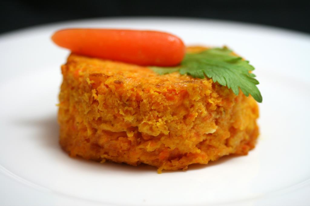 Carrot Soufflé 2 pounds fresh carrots, sliced* 6 large eggs 1 cup sugar, divided 1/3 cup matzo meal 3/4 cup butter or margarine, melted and divided 1/4 teaspoon salt 1/8 teaspoon ground nutmeg 2