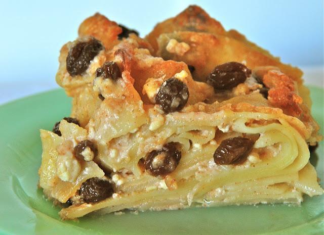 Noodle Kugel 1/2 pound wide kosher for Passover egg noodles 1/2 stick butter, melted 1 pound cottage cheese 2 cups sour cream 1/2 cup sugar 6 eggs 1 teaspoon ground cinnamon 1/2 cup raisins Preheat