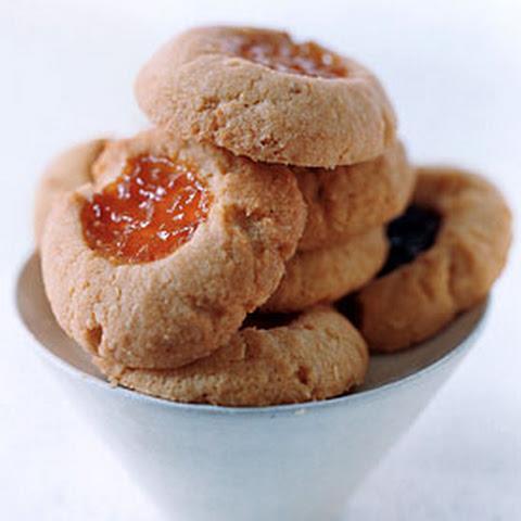 Almond Thumbprint Passover Cookies ¾ C sliced blanched almonds, toasted, cooled 2/3 C sugar 2/3 C matzo cake meal ¼ teaspoon salt 1 stick (1/2 C) unsalted butter, melted and cooled slightly 1 large