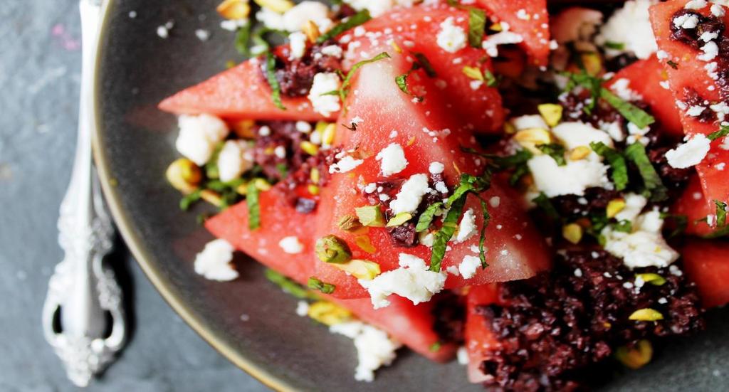 WATERMELON AND FETA SALAD From the Cookbook Zahav Arrange 1/2 small watermelon, rind removed and cut into1-inch wedges, approximately 4 cups. Season with salt and place on a platter.