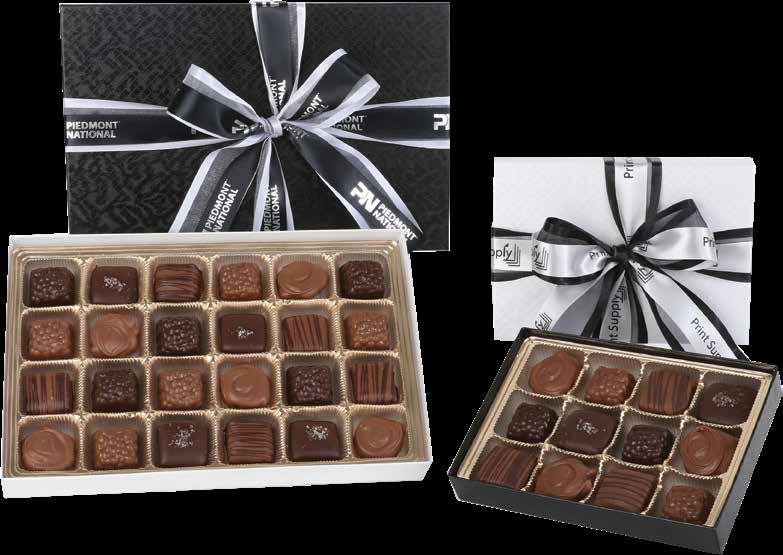 Chocolate Maggies (Turtles ). Presented in your box choice - either Black Top with White Base or White Top with Black Base tied with a double ribbon imprinted with your logo.
