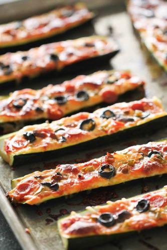 DAY 1 SMALLER FAMILY- BAKED PIZZA STUFFED ZUCCHINI BOATS M A I N D I S H Serves: 4 Prep Time: 10 Minutes Cook Time: 18 Minutes 4 medium zucchini 1/2 cup marinara sauce 1 cup shredded mozzarella