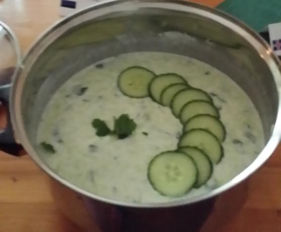 Recipes from Germany STARTERS - Cold cucumber soup 4 Cucumbers 1500 ml Natural yoghurt 4 cloves of Garlic (if you like) 4 ts (table spoons) Chopped mint 6 ts Olive oil 500 ml Icy water white Pepper