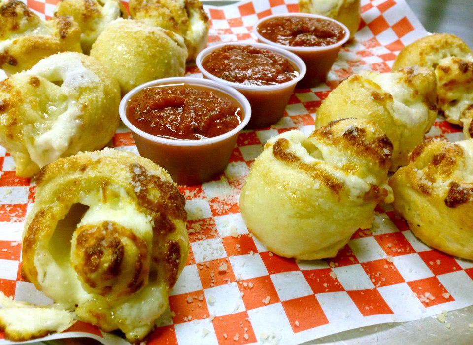 95 more EXTRA CHEESY GARLIC ROLLS We take our already incredibly delicious Garlic Rolls and stuff them with Mozzarella cheese! Served with our homemade marinara sauce for dipping. 3 Rolls ~ 4.