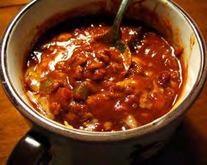 Chili Soup Serves: 6 Serving Size: 1½ cups 1 pound 90% lean ground beef 1 small onion*, chopped (~1/2 cup) 1 medium green pepper, chopped (~1/2 cup) 1 can corn* (14-16 ounces) 1 can stewed tomatoes