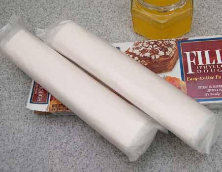 6 The phyllo dough pastry sheets (spelled fillo above) I buy are typically wrapped in two plastic packages, making it easy to use half for the bottom crust and the remaining