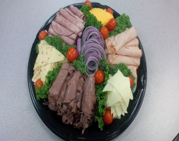 Catering Available Year Round PARTY TRAYS The following items are priced to serve 20 guests. Prices include delivery, set-up & paper goods.