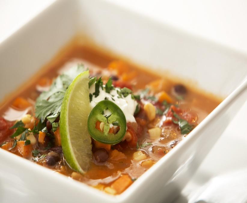 Sweet Potato and Black Bean Soup Serves: 6 Ingredients 2 sweet potatoes 2 cans black beans 1 can diced tomatoes 2 garlic cloves, minced 1 onion, chopped 6 cups chicken broth 1 cup frozen corn 2